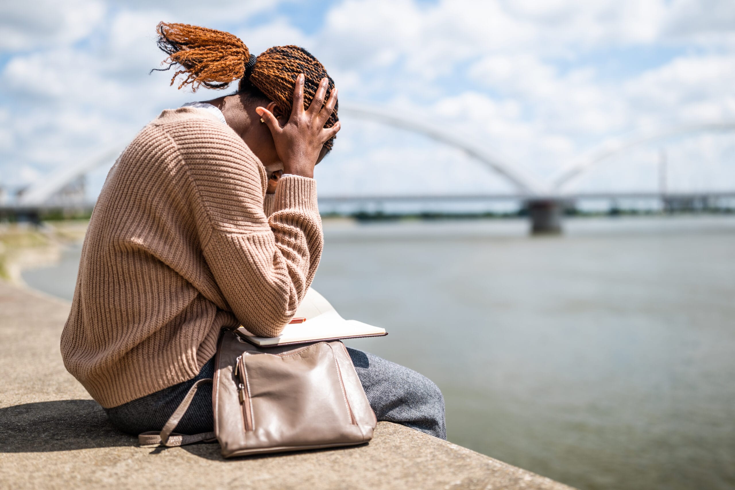 Woman experiencing a shame spiral in The Woodlands demonstrating how perfectionism impacts the process of how to heal from trauma