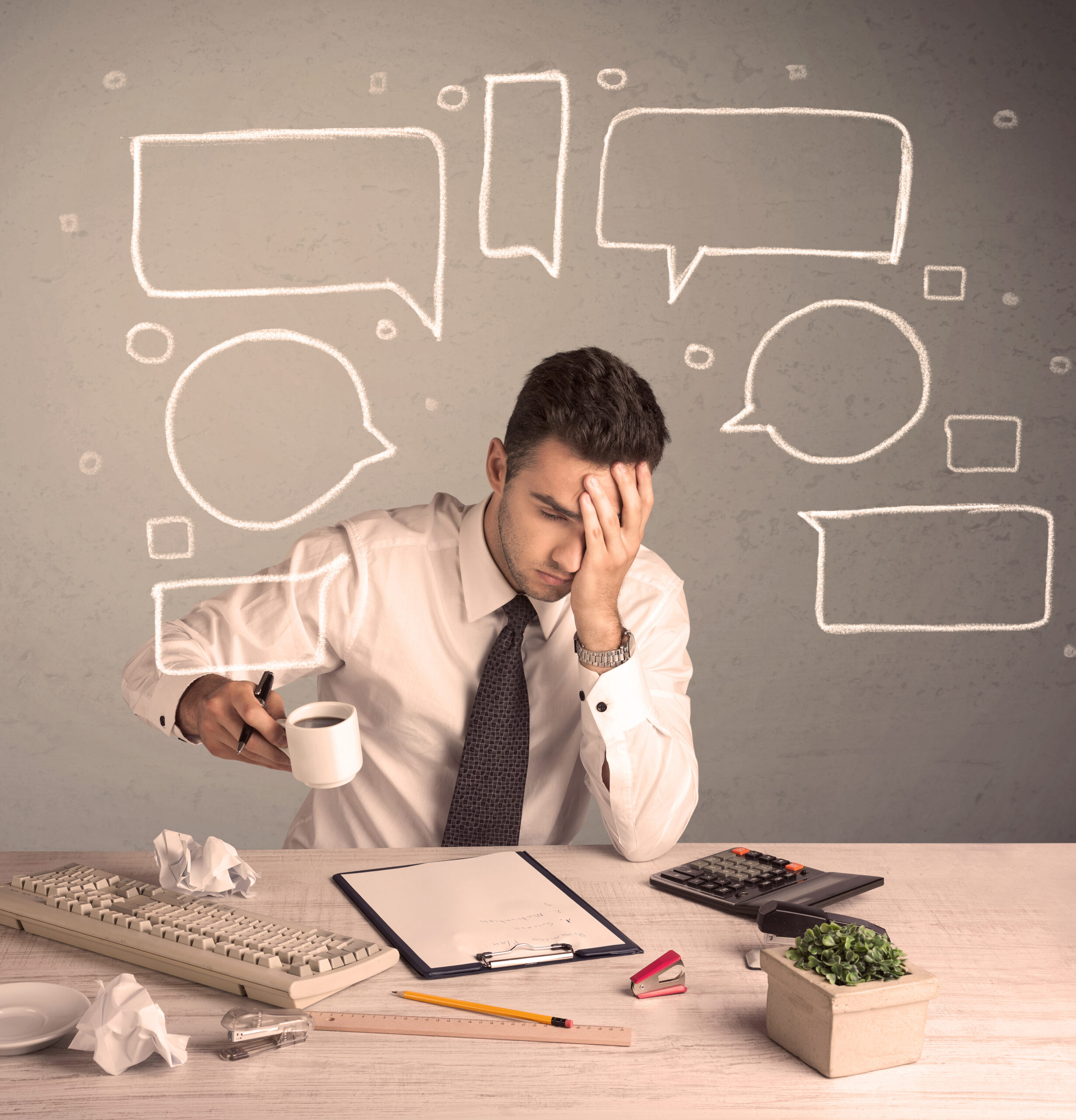 An exhausted high achieving professional in The Woodlands struggling with mental clutter at his desk representing the burnout loop faced by adhd and depression adults treated at Acceptance Path Counseling 