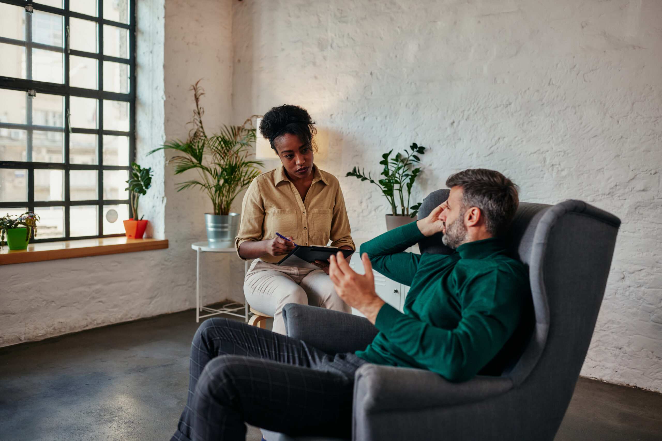 Adult man in The Woodlands discussing ADHD and depression with a therapist during a clinical counseling session  Acceptance Path Counseling