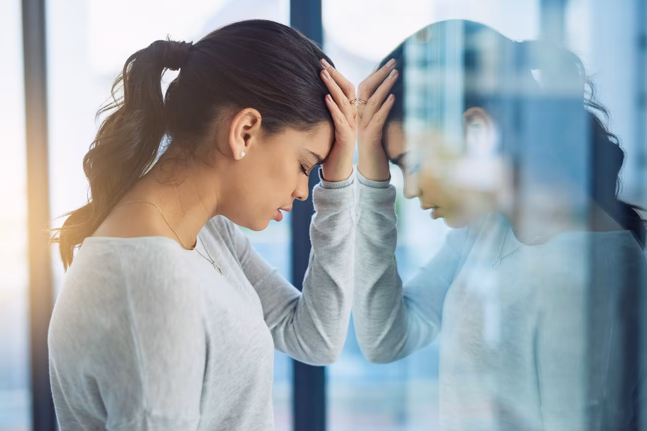 A Louetta professional experiencing the internal racing mind of high functioning anxiety while maintaining an executive appearance in Houston Willowbrook