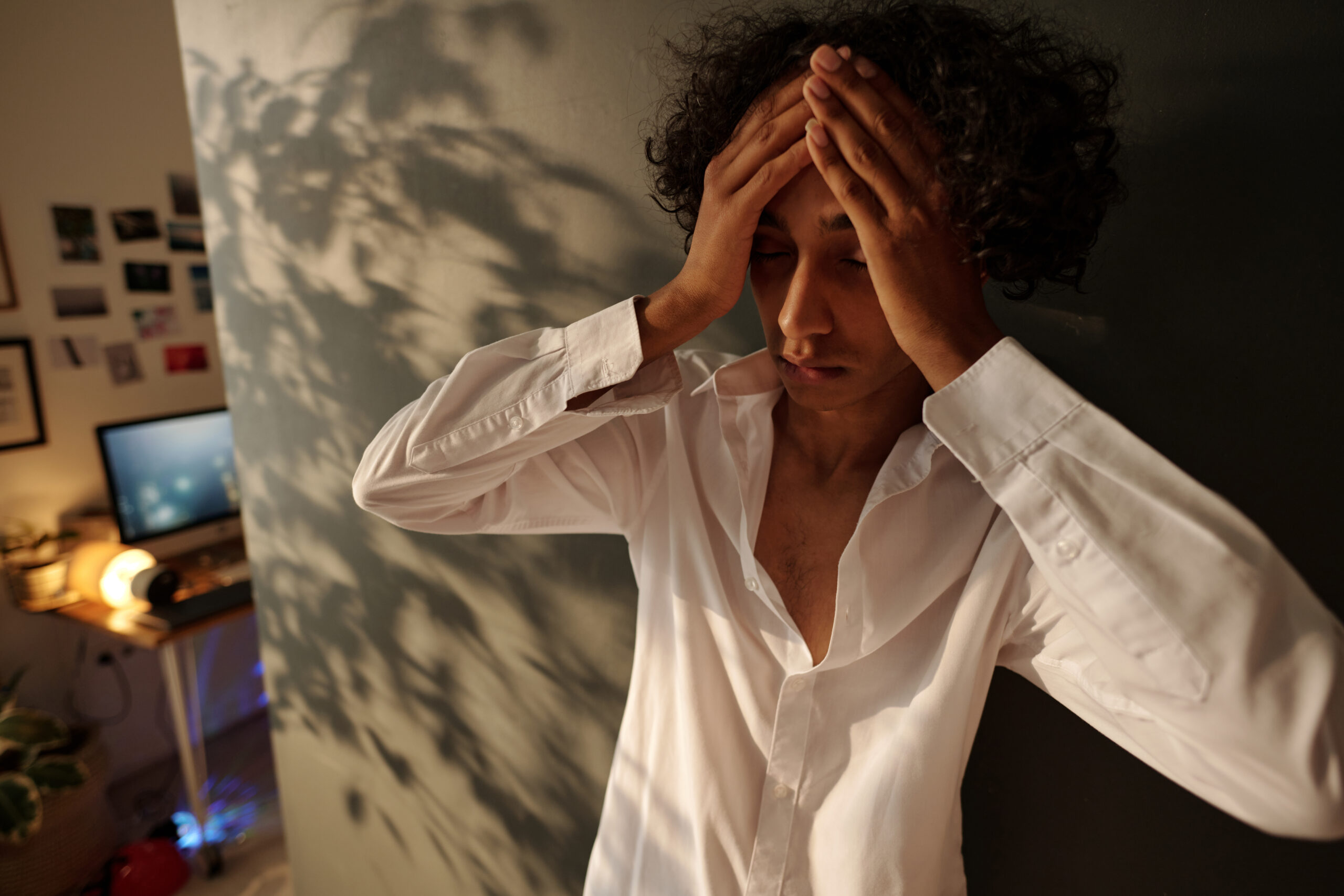 Individual showing physical symptoms before starting therapy for anxiety counseling