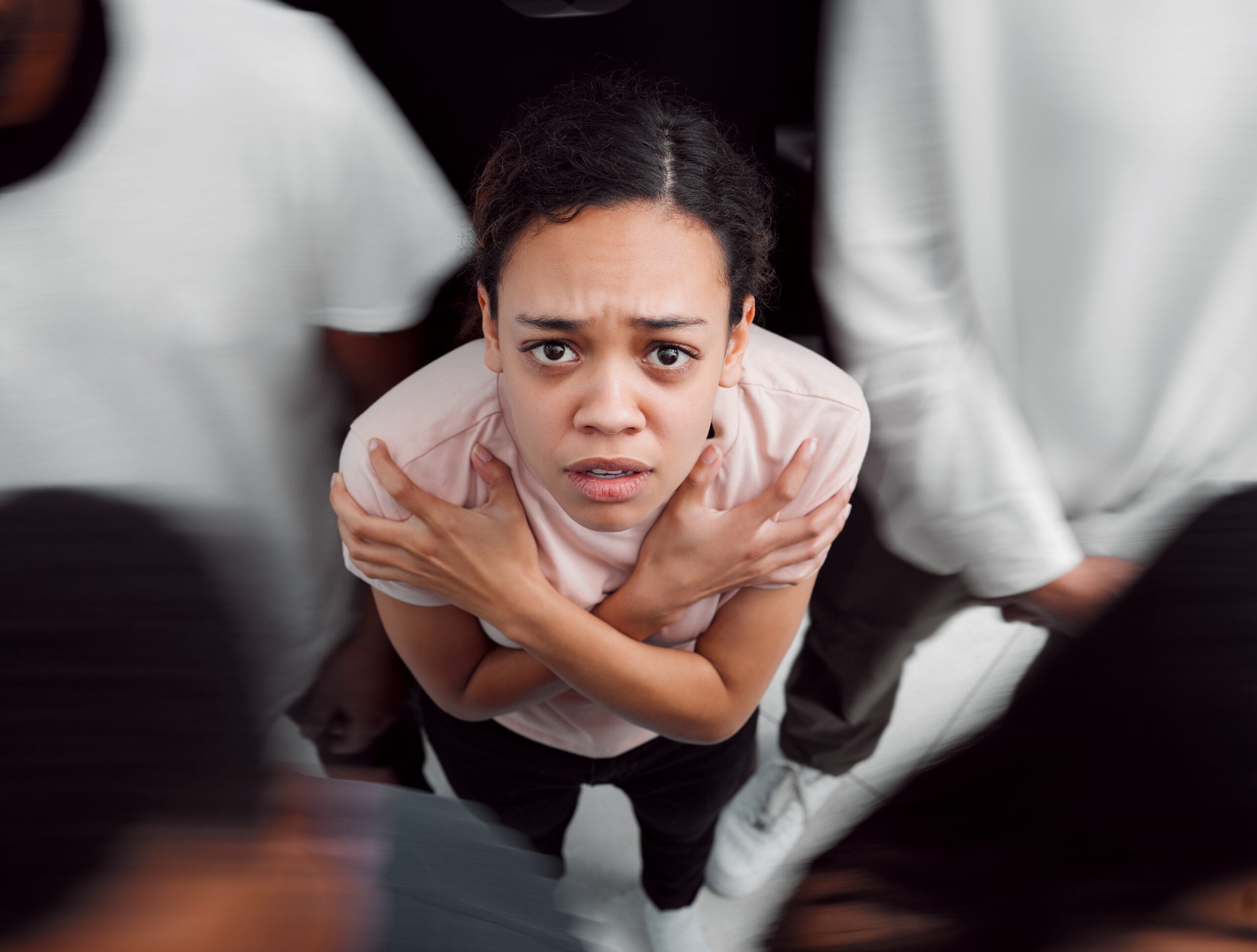 Person experiencing panic and stress during therapy for anxiety treatment