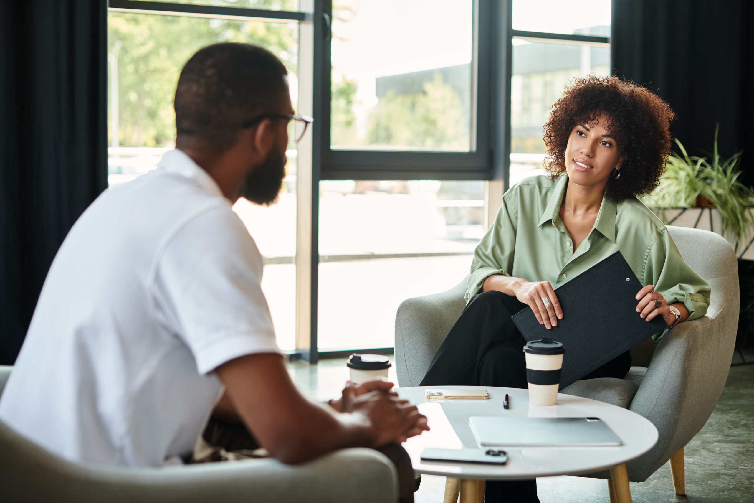 Professional trauma informed counselor helping a client build healthy coping skills