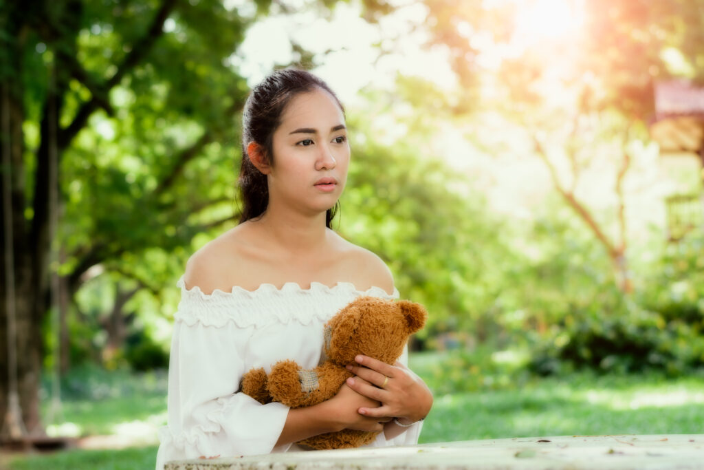 Individual exploring personal growth through childhood trauma therapy for adults