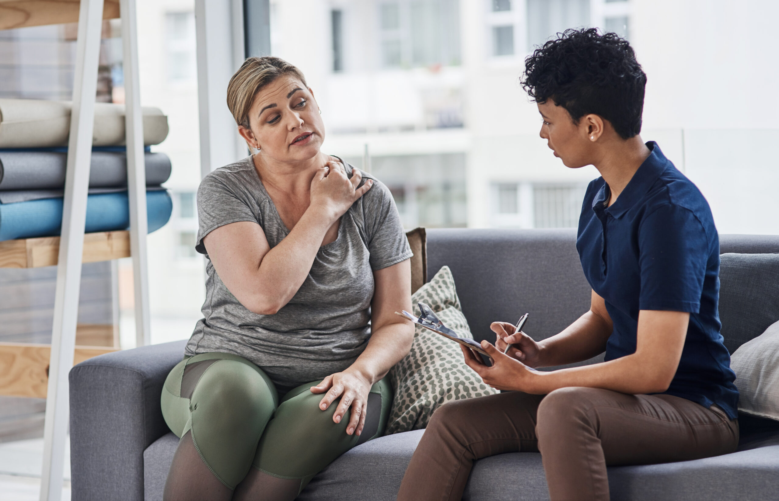 Client working with a trauma informed counselor to improve emotional well being