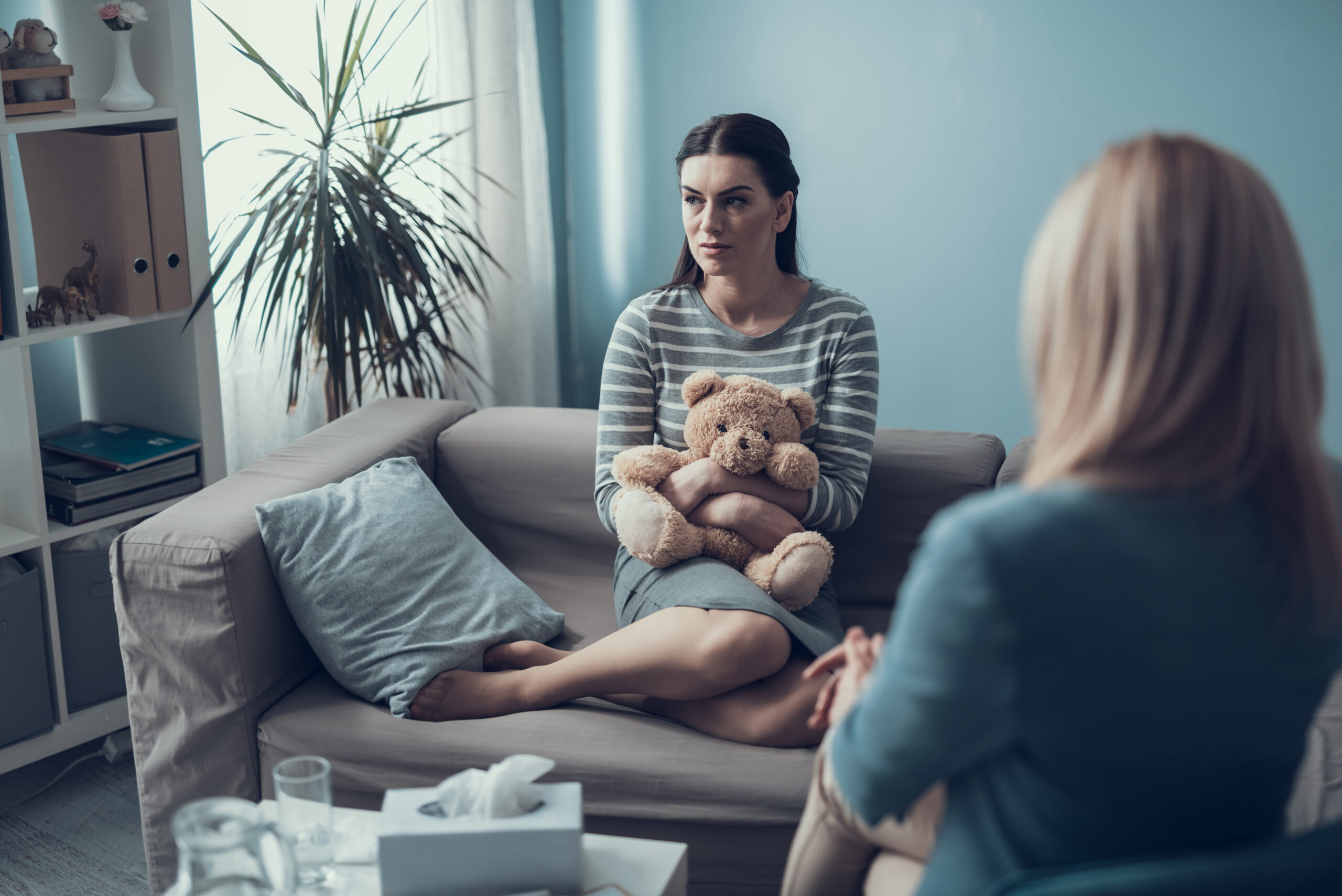 Counseling session focused on childhood trauma therapy for adults and emotional healing