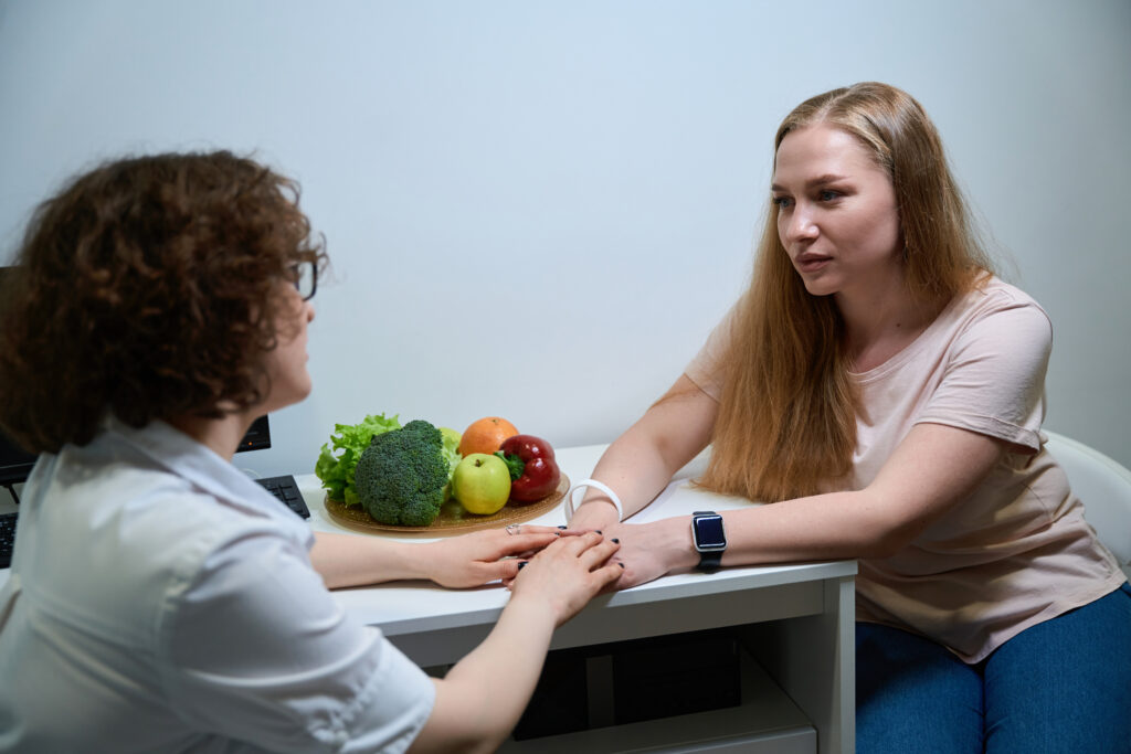 Therapist explaining how to treat eating disorders through structured counseling and emotional support strategies