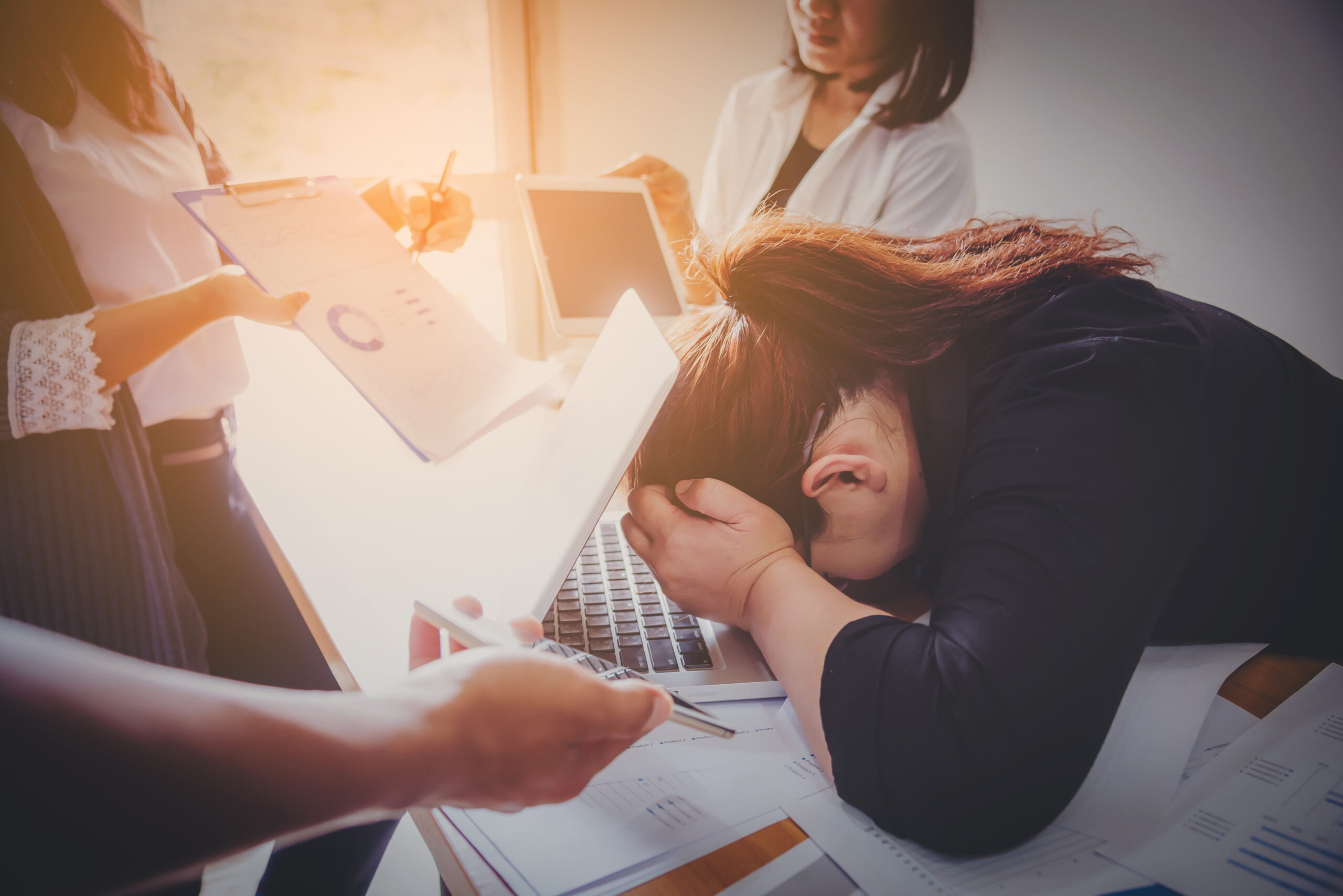Exhausted professional considering whether ongoing fatigue may reflect burnout or depression