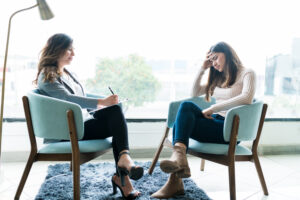 Person learning about the early signs of bipolar disorder including changes in mood sleep and energy