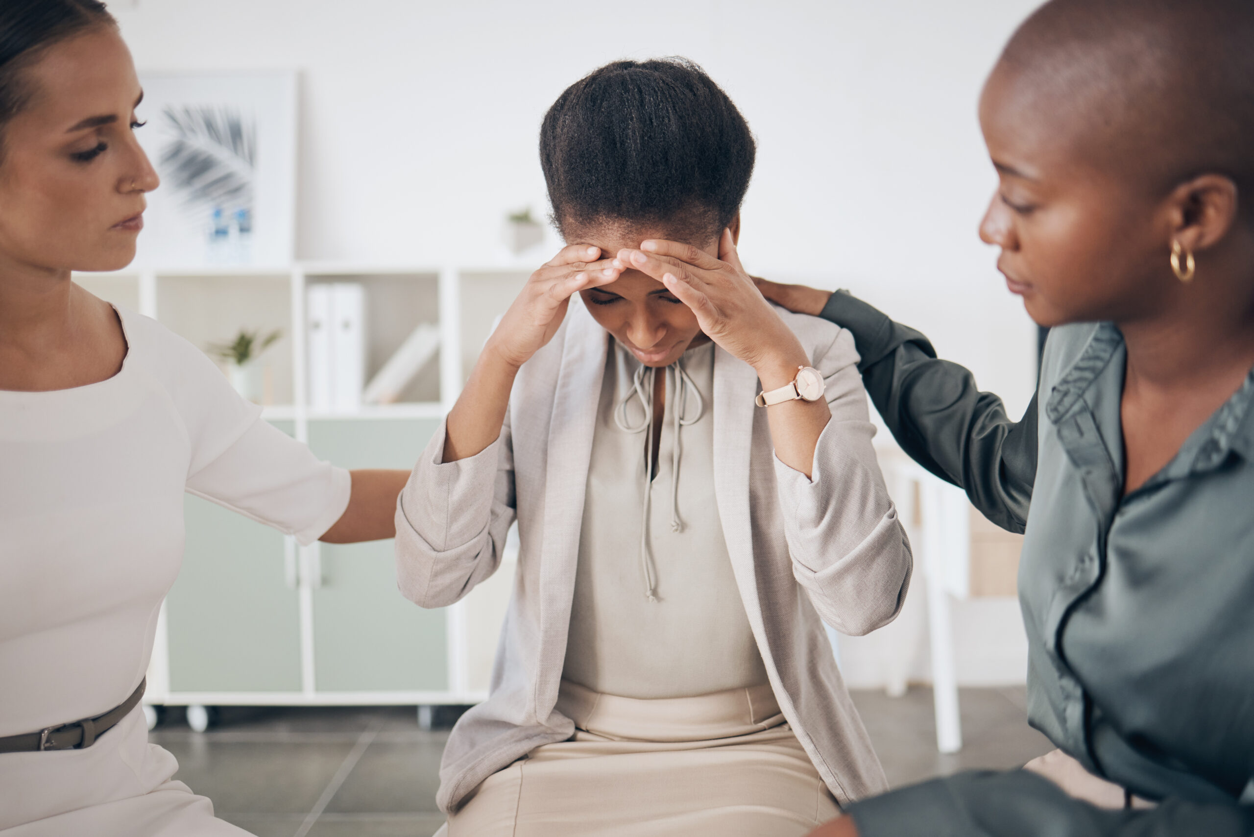 Therapist explaining how trauma can influence the brain and nervous system during counseling