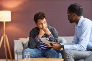 Counselor helping a client manage ADHD time blindness with practical planning strategies