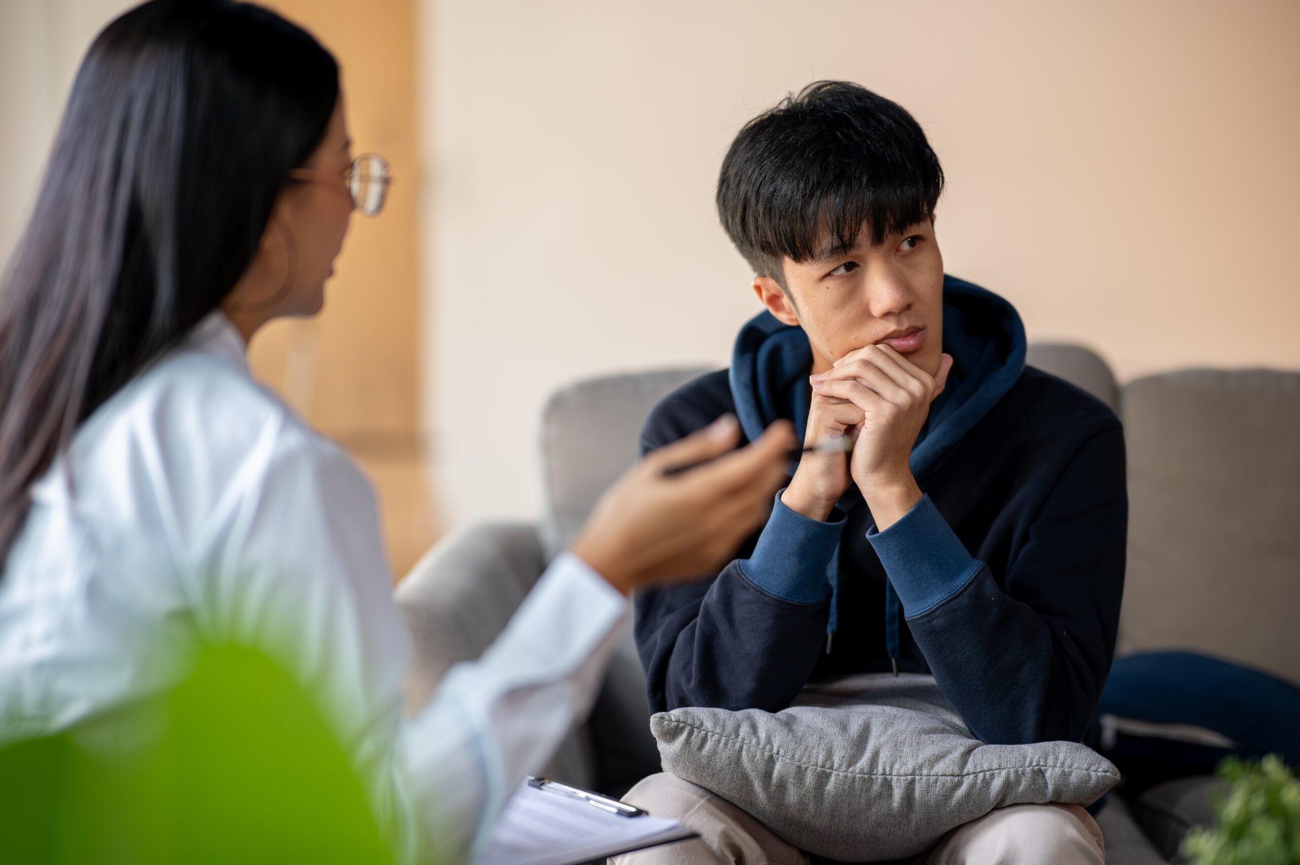 Counselor explaining panic attack vs panic disorder during a therapy session