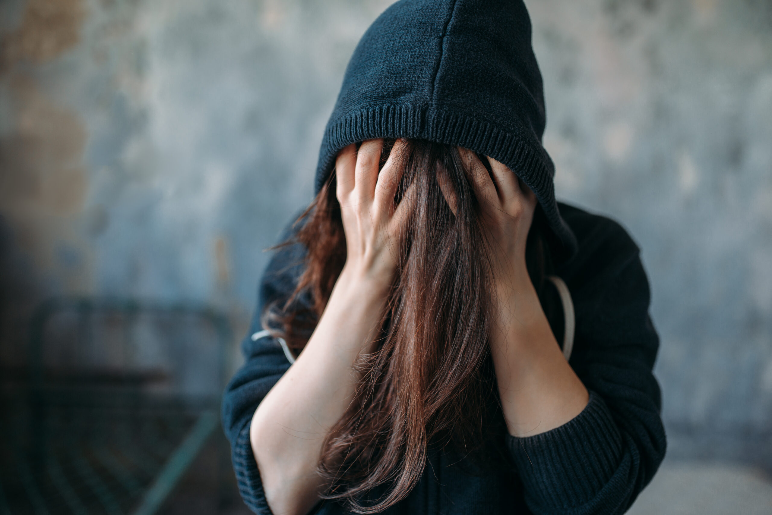 Person experiencing a BPD episode while feeling overwhelmed by intense emotions