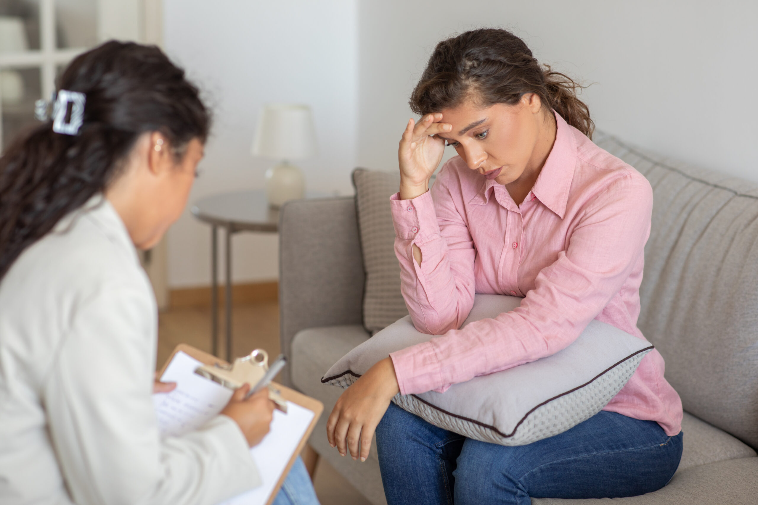 Distressed Woman in Consultation with a Concerned Professional Acceptance Path Counseling Mental health illustration representing depression and fatigue with persistent exhaustion