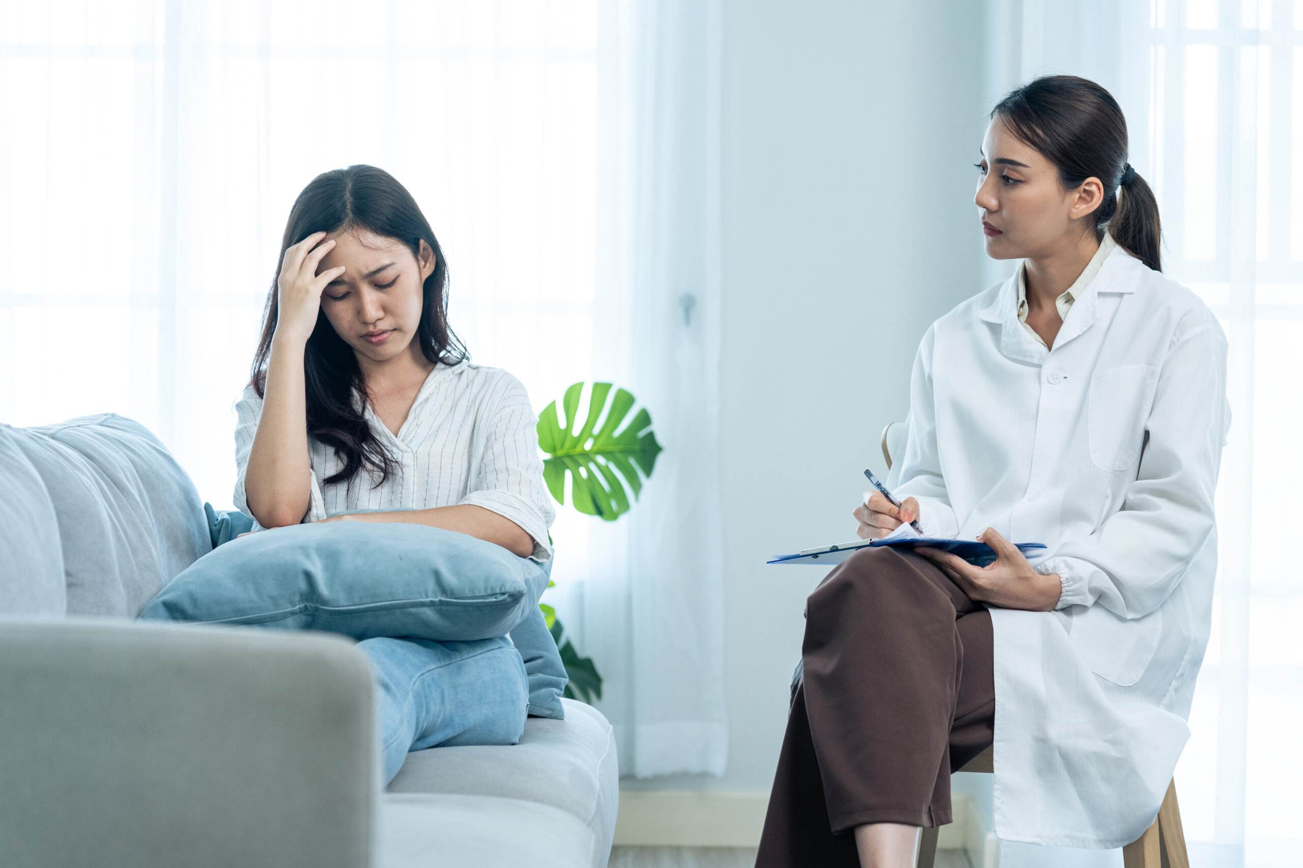 Counselor helping a client understand the connection between anxiety and physical sensations