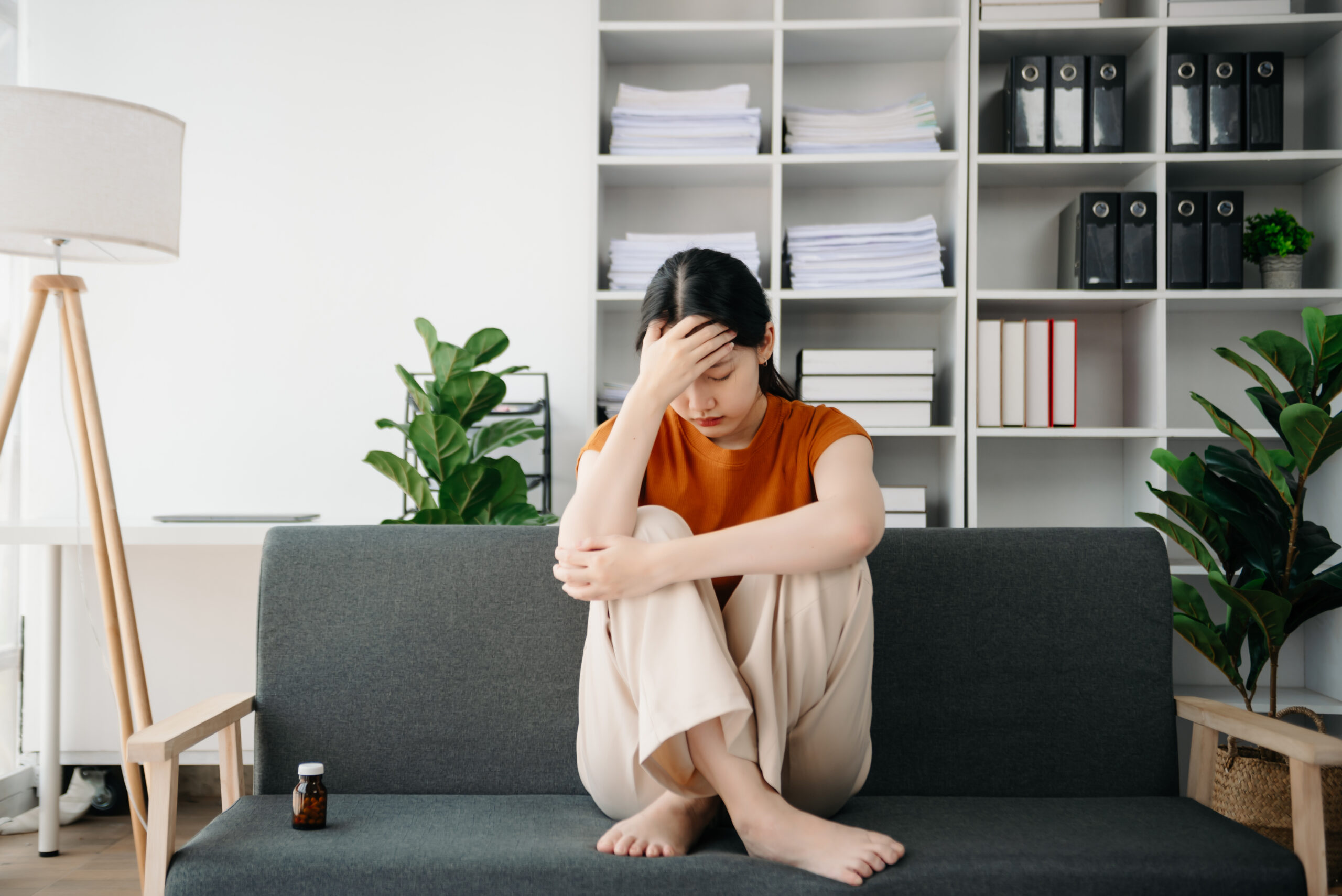 Individual searching symptoms online while feeling increasingly worried about their health