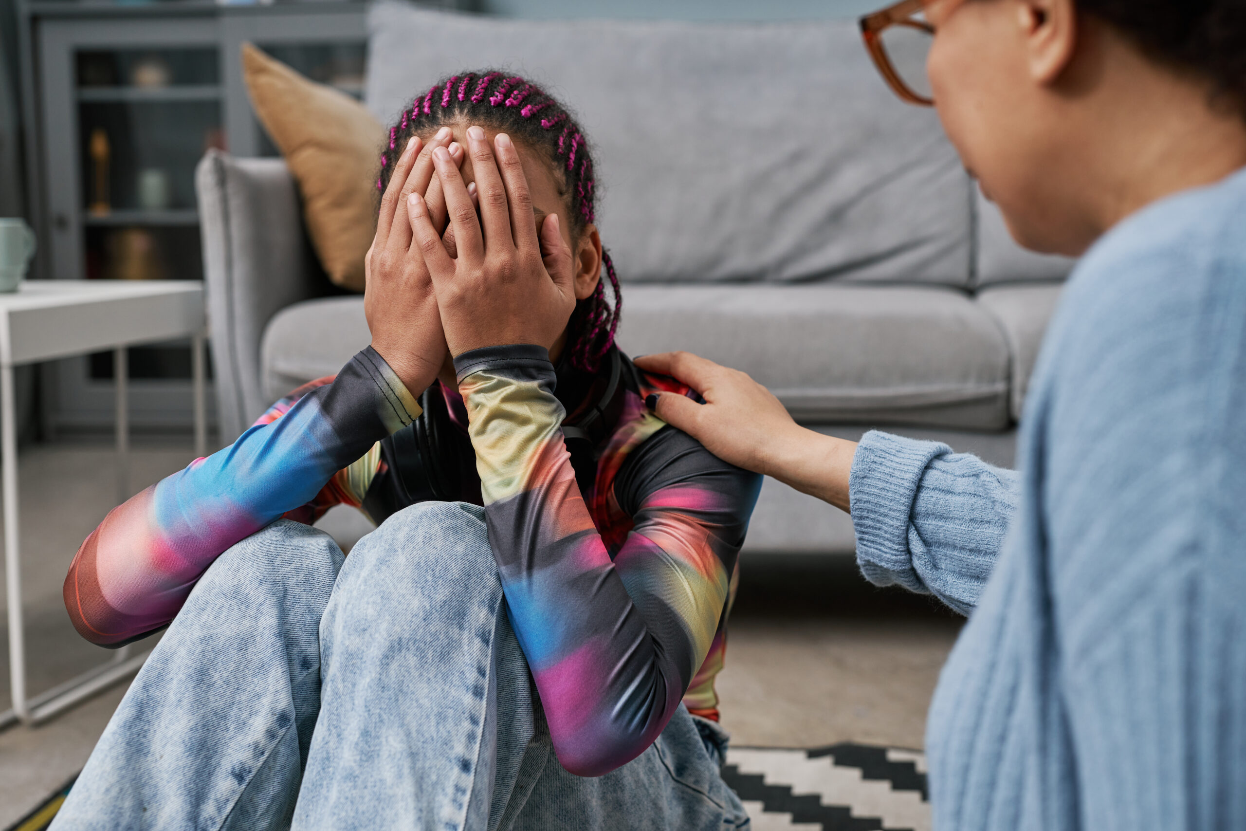 Individual pausing before reacting when a trauma reminder activates an intense emotional response