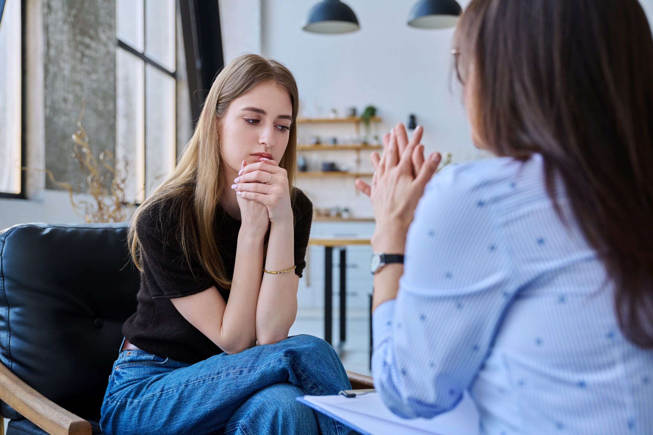 Therapist helping a client understand nocturnal panic attacks and nighttime fear patterns